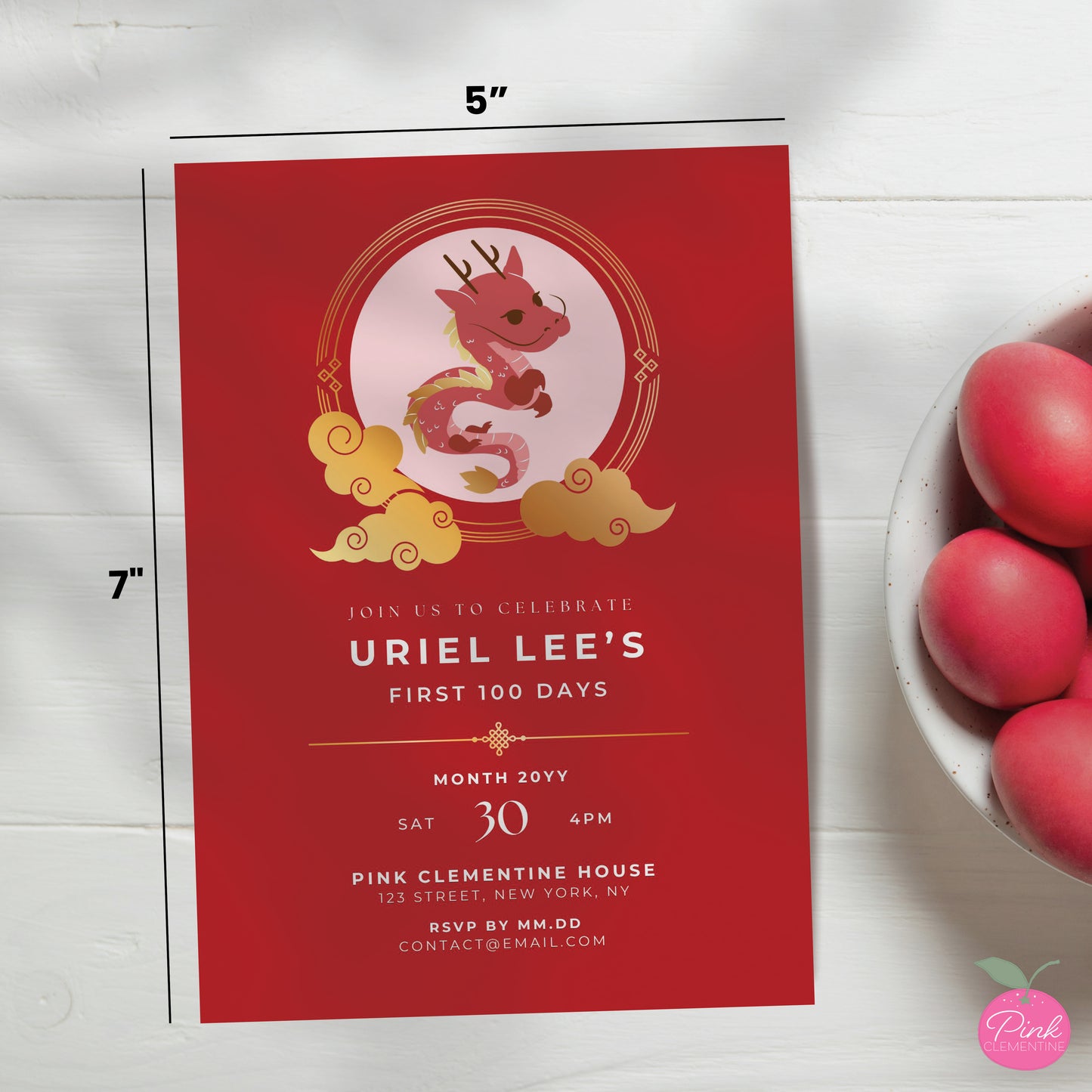 Red egg and ginger baby shower editable invitation template. Design features red baby dragon in round frame wrapped and faux gold clouds. 5"x7" dimensions indicated.